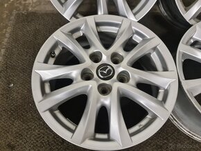 Mazda 5x114,3 R16 alu. - 9