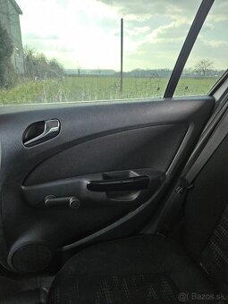 Opel Corsa D 1.3 CDTI 55kw - 9