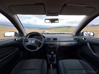 Škoda Octavia 1.4 benzín Tour - 9