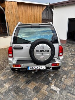 Grand vitara 2.0 94 kw - 9