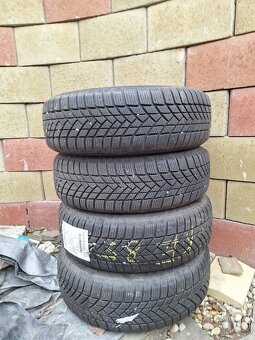 Kia plechové disky + zimné pneu 185/65  R15 + puklice KIA - 9