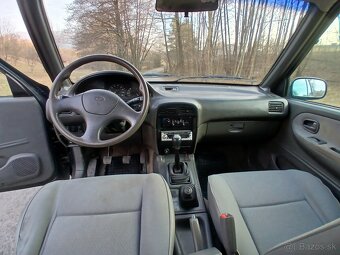 Kia Sportage I. 2.0td - 9