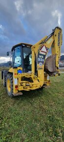 Traktorbager Komatsu WB - 9