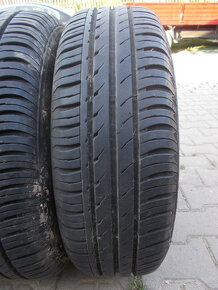 Plechové disky Ford + 185/65R14 - 9