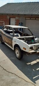 Fiat 128 SL Coupe  prednú masku,kryty svetiel,kapotu volant - 9