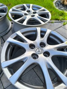 4x100 R16 Mazda alu disky - 9