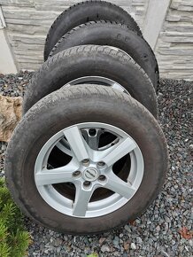 Nissan qashqai  5x114.3.j16 pneu 215,65,r16 zimne - 9