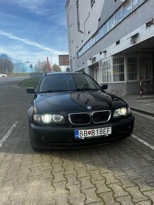 BMW 320d touran - 9