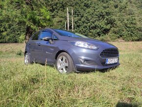 Ford Fiesta 1.25 Collection X (60kw/82ps), BOHATA vybava - 9